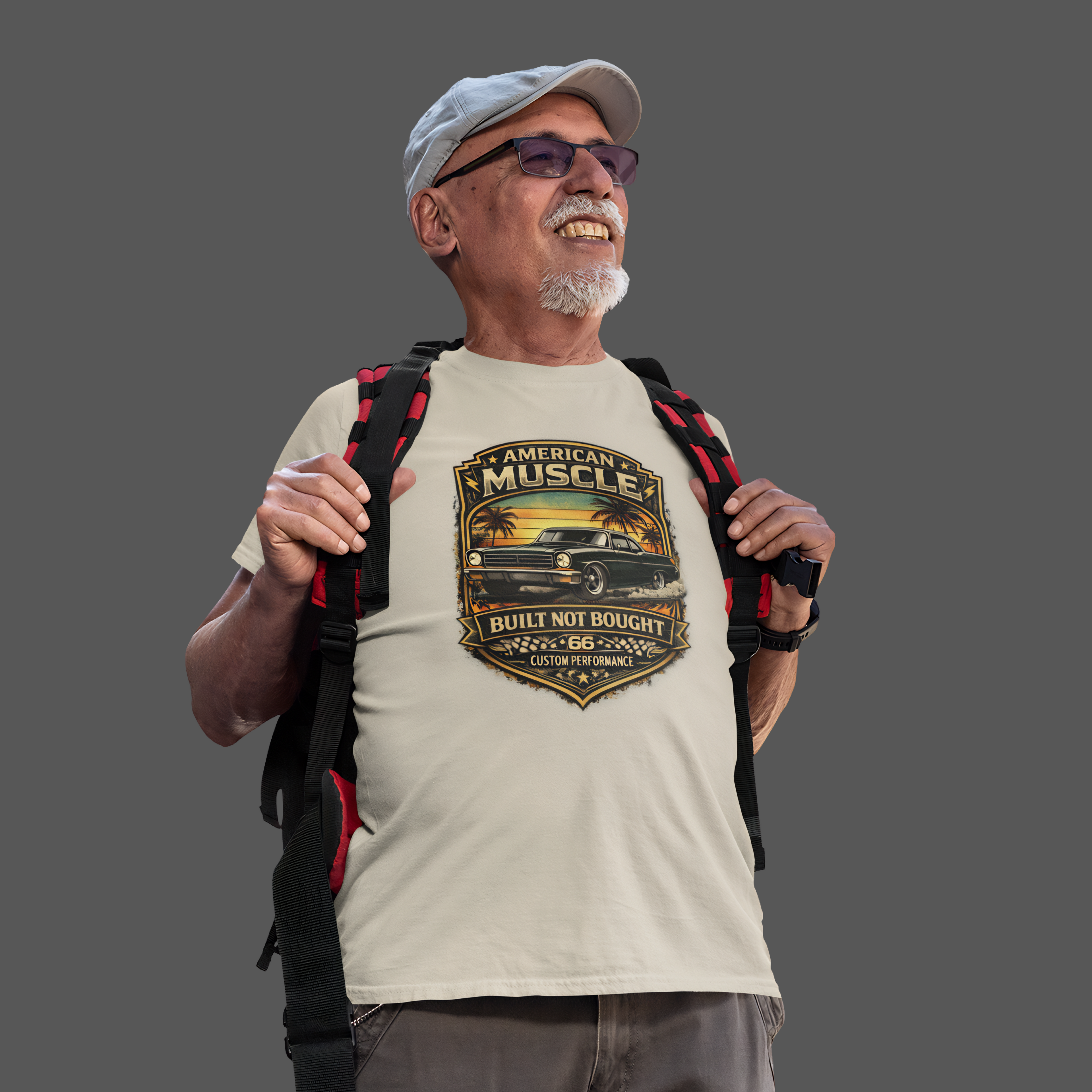 Man wearing a white t-shirt with a classic car graphic design and carrying a backpack on a gray background