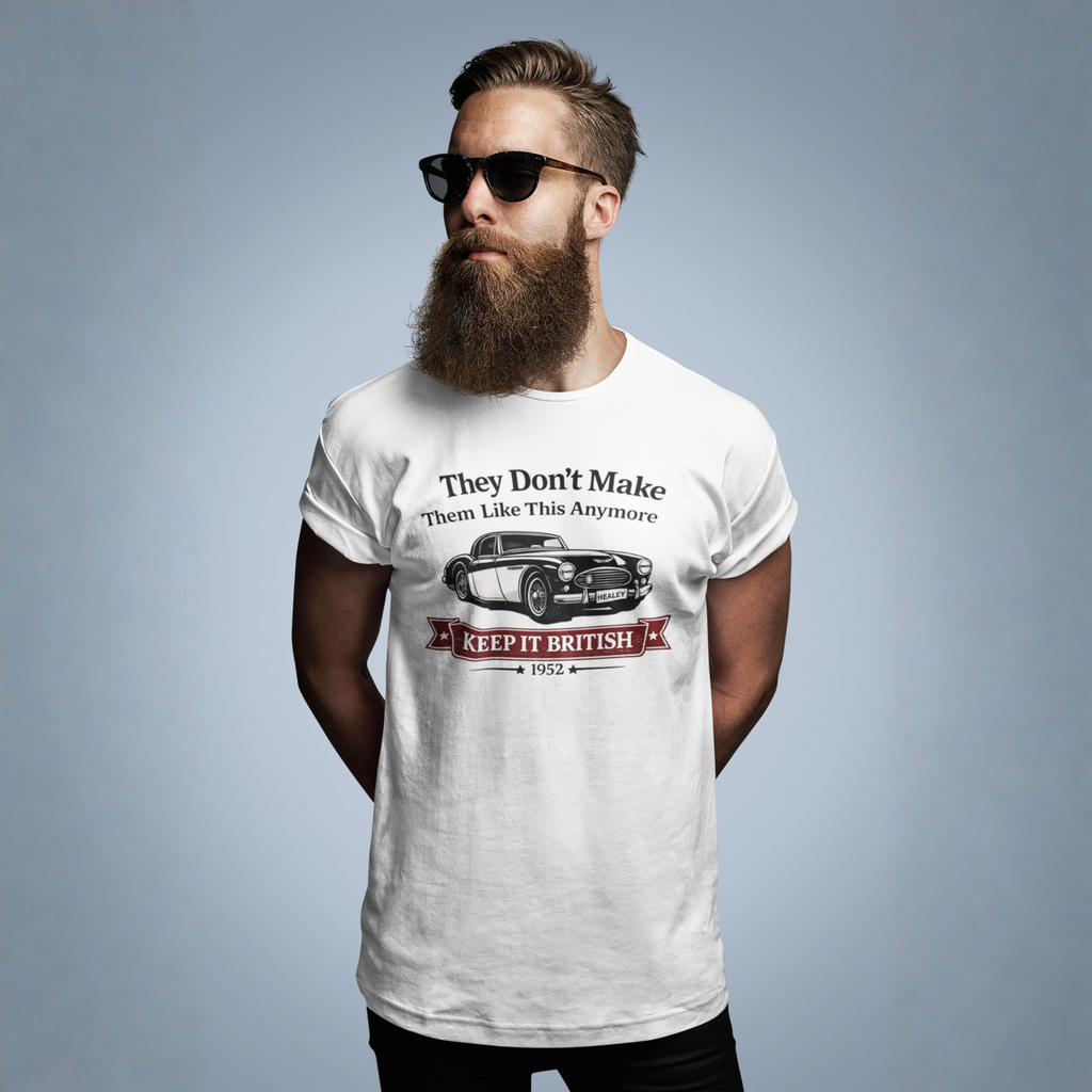 Man wearing a white t-shirt with a graphic Healey car design on a gray background