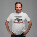 Man wearing a white t-shirt with a graphic Healey design and text on a gray background