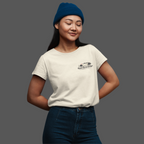 Girl wearing a white t-shirt with a Healey classic car graphic design on a gray background
