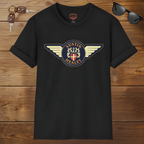 Black t-shirt with Austin Healey logo on a wooden surface with sunglasses and keys.