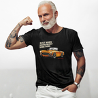 Man wearing a black t-shirt with a graphic and text, flexing his arm on a white background