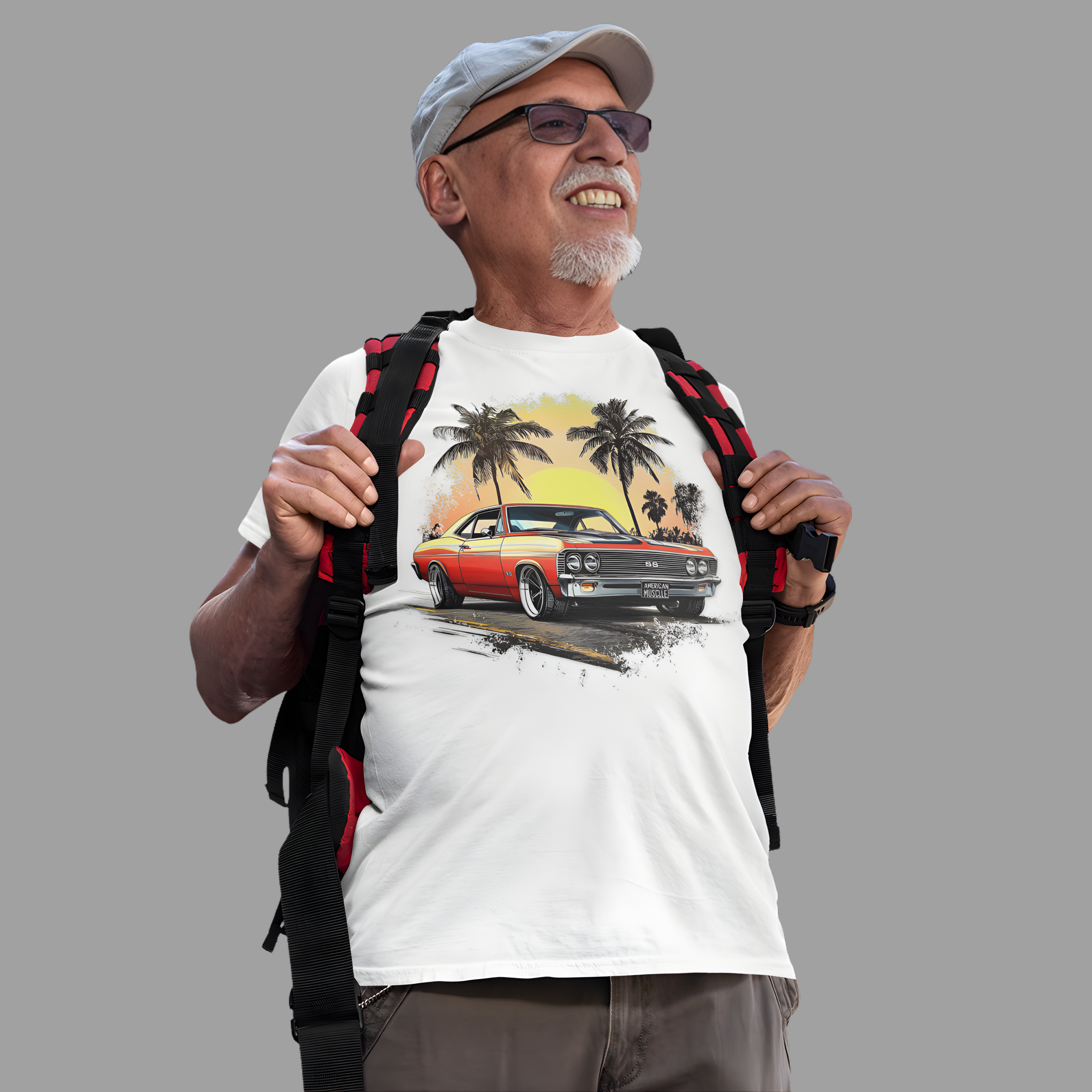 Man wearing a white t-shirt with a classic car and palm tree design, holding a backpack on a gray background