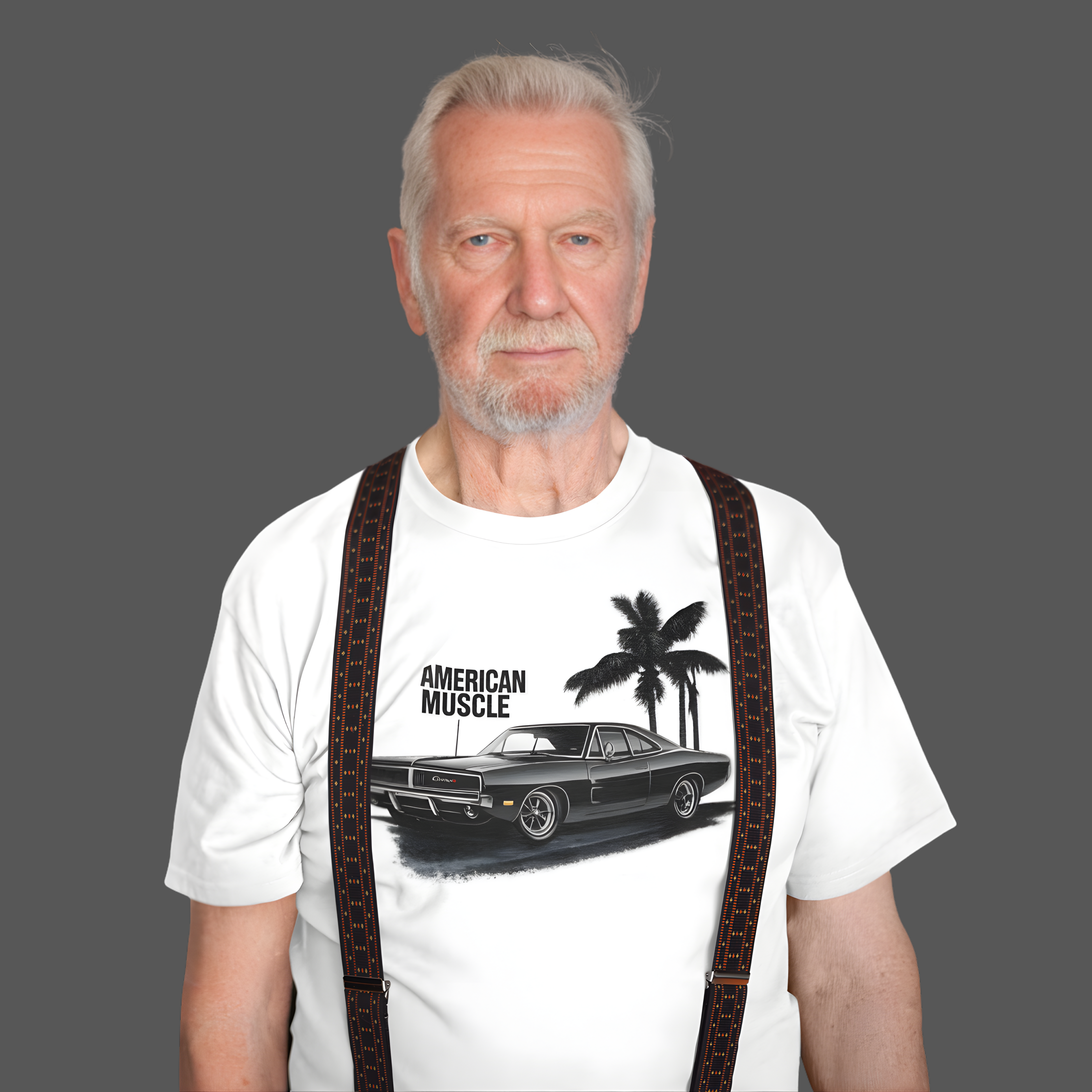 Man wearing a white t-shirt with a graphic design of a car and palm trees, text 'American Muscle' on a gray background.