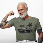 Man wearing a military green t-shirt with a car graphic and 'American Muscle' text, flexing his arm.