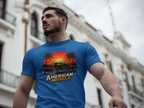 Man wearing a  royal blue t-shirt with 'American Muscle' graphic design in an urban setting