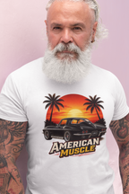 Man wearing a white t-shirt with 'American Muscle' graphic design on a pink background