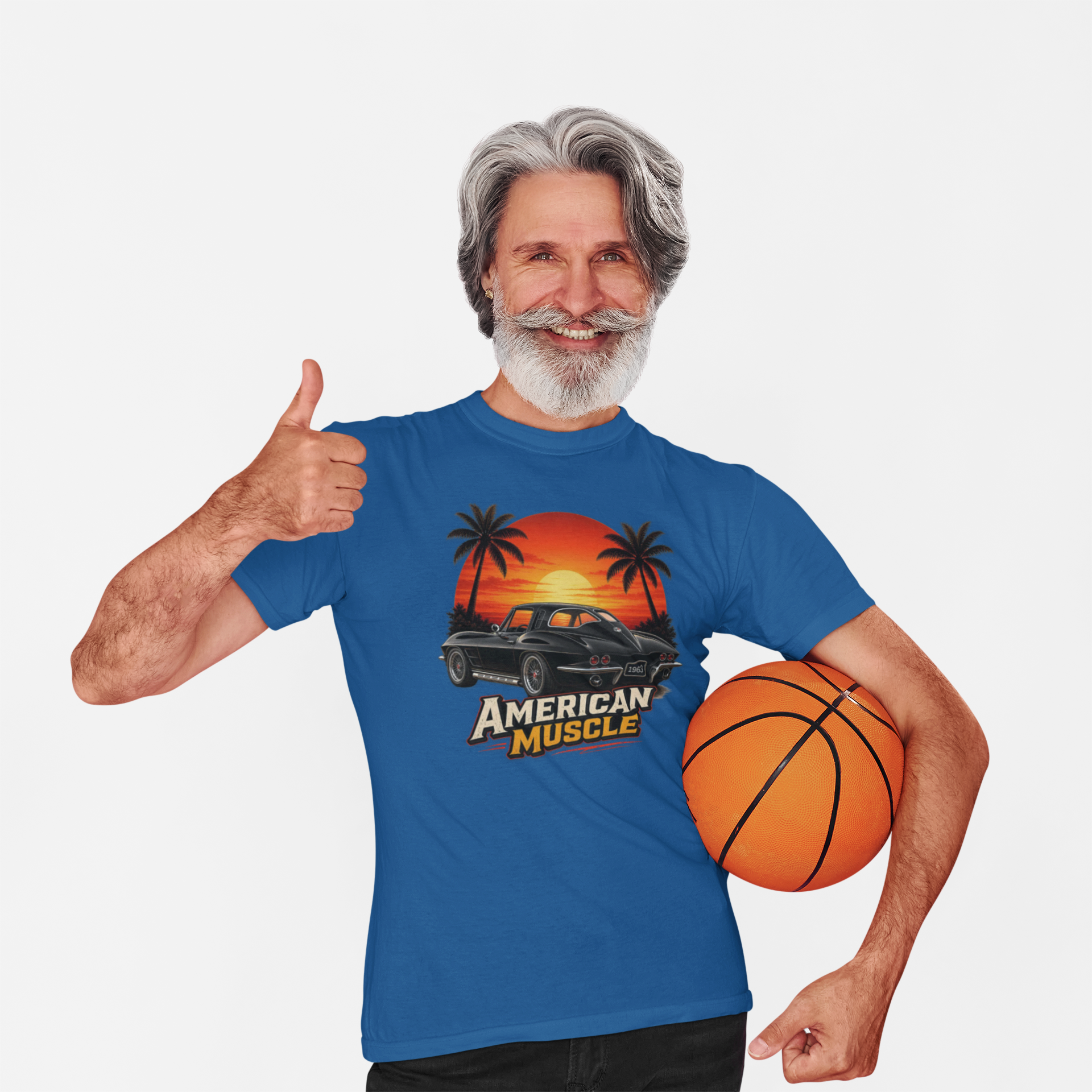 Man wearing a royal blue t-shirt with 'American Muscle' graphic design, holding a basketball.