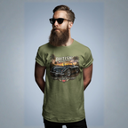 Man wearing a military green t-shirt with a car graphic and text against a light blue background