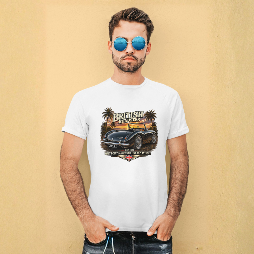 Man wearing a white t-shirt with a car graphic and sunglasses against a beige wall