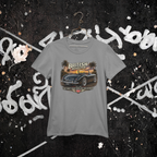 Gray t-shirt with a car graphic and 'British Roadster' text on a graffiti-covered wall background