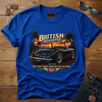 Royal blue t-shirt with a graphic of a British roadster car on a wooden surface.