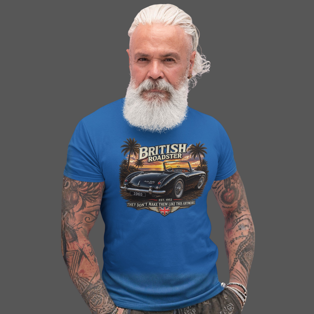 Man wearing a royal blue t-shirt with a vintage car graphic and 'British Roadster' text.
