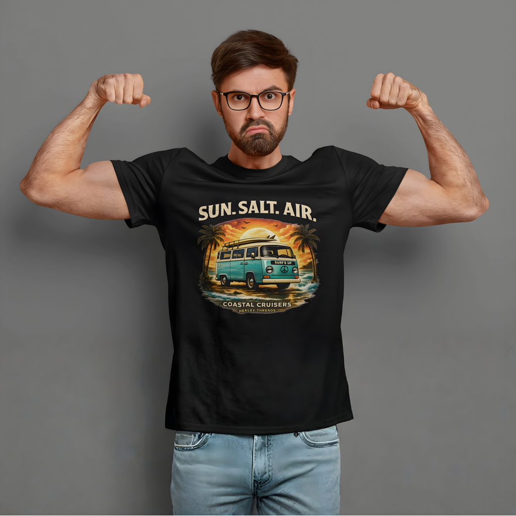 Man wearing a black t-shirt with a graphic retro van design and text, flexing his muscles against a gray background