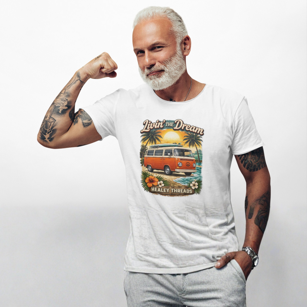 Man wearing a white t-shirt with a graphic design of a van and palm trees, flexing his arm on a plain background.