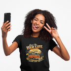 Woman wearing a 'Van Life' black t-shirt and taking a selfie.