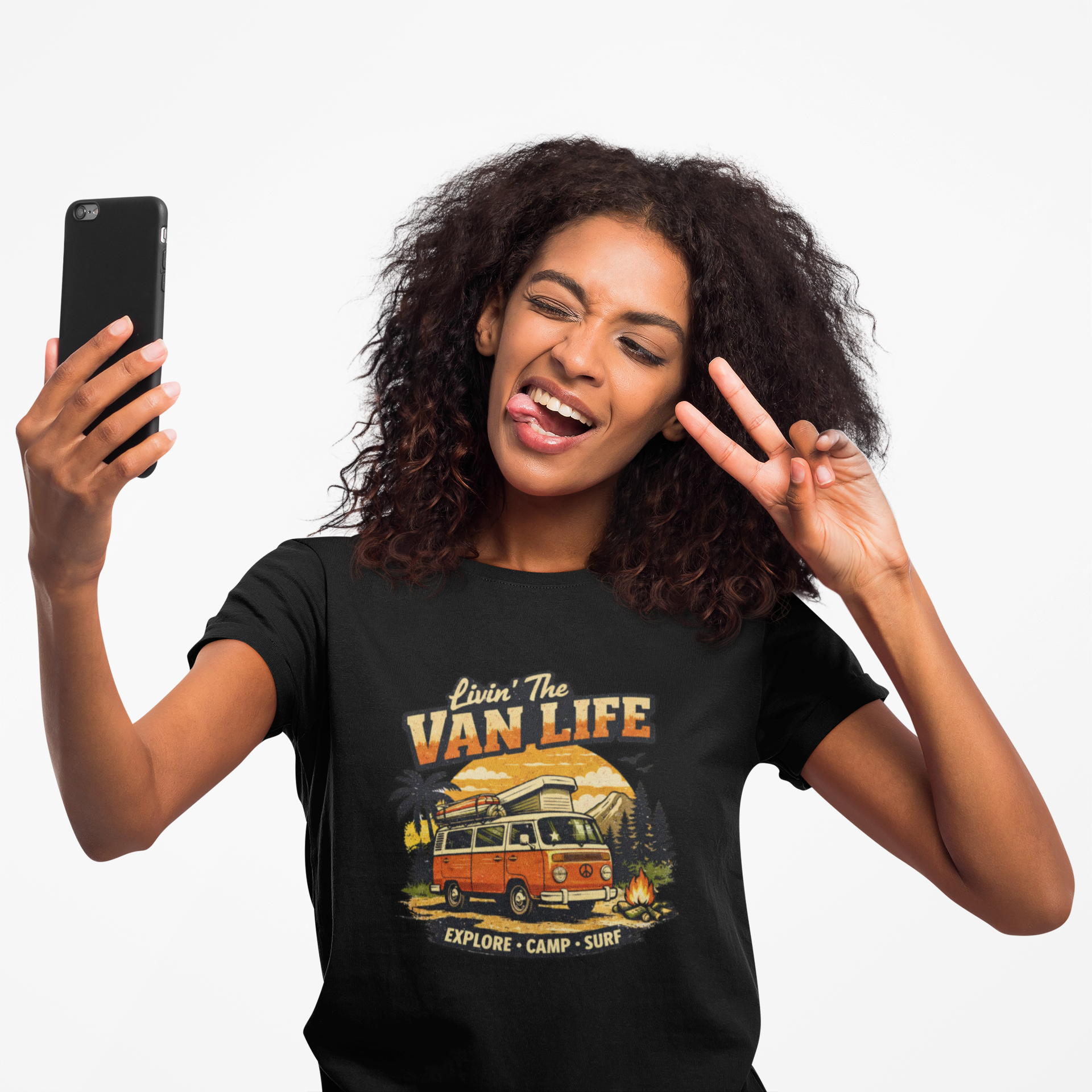 Woman wearing a 'Van Life' black t-shirt and taking a selfie.