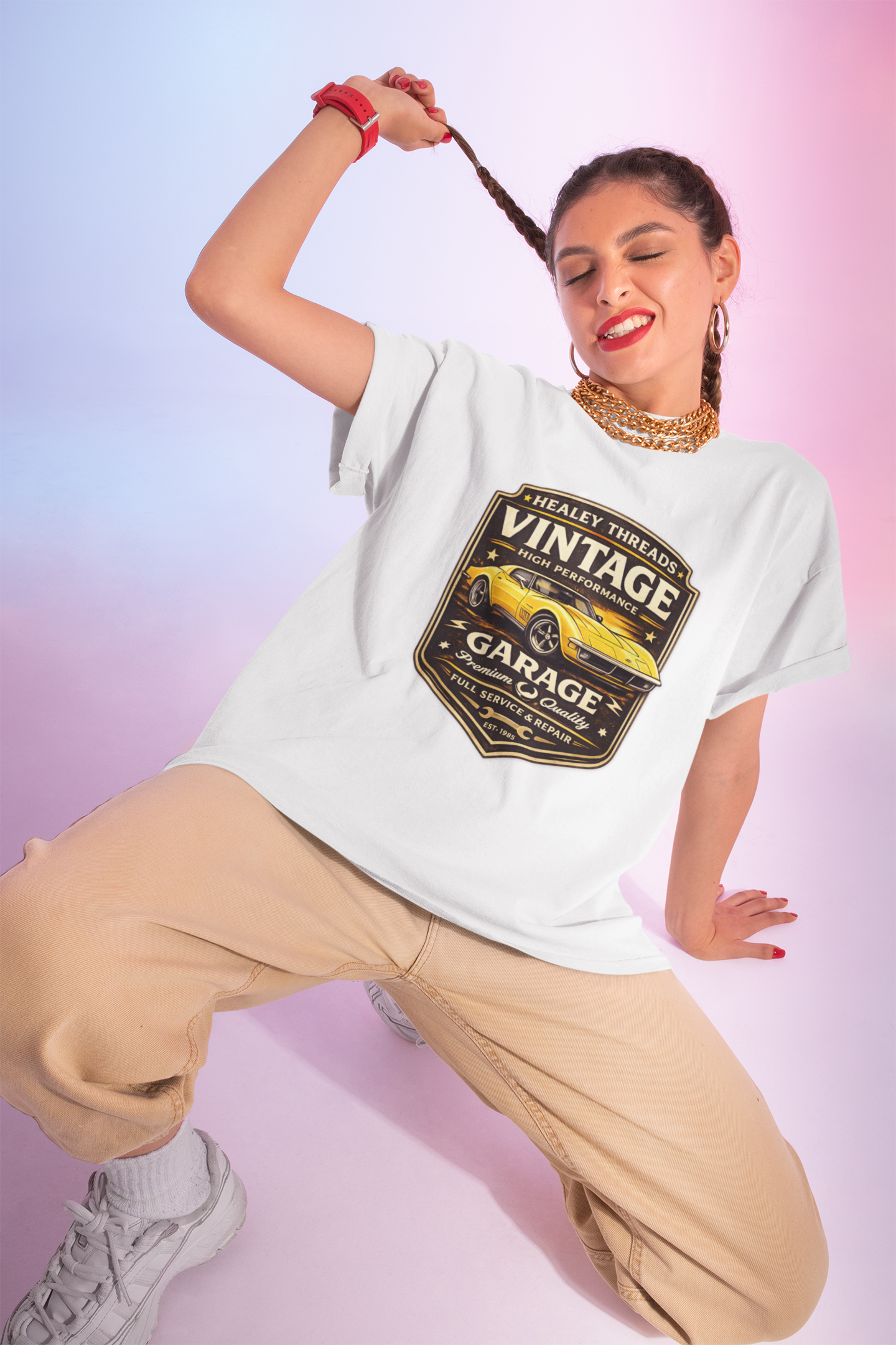 Woman wearing a white t-shirt with a vintage classic car graphic on a gradient background