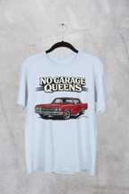 Light blue t-shirt with red car graphic and 'No Garage Queens' text on a textured gray background
