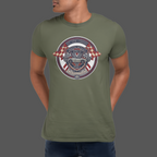 Man wearing a military green t-shirt with a graphic Healey Sprite design on a gray background