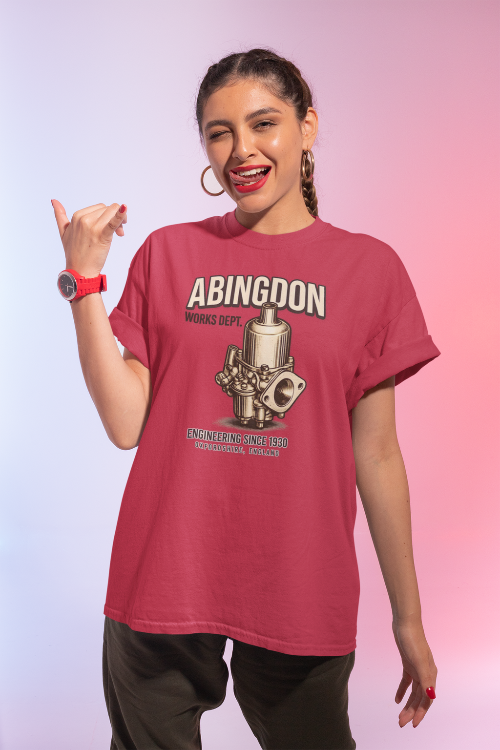 Woman wearing a red t-shirt with 'Abingdon' graphic design on a gradient background