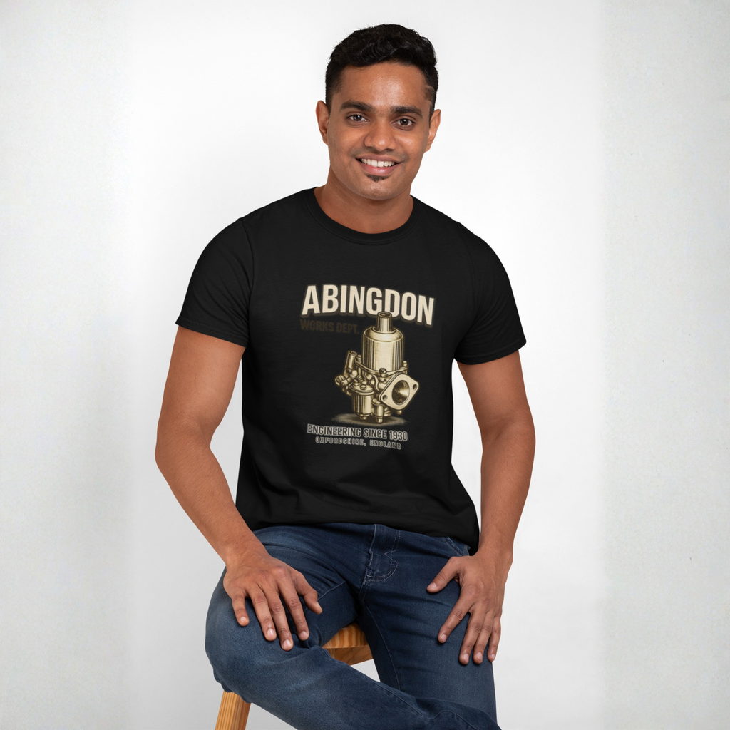 Man wearing a black t-shirt with 'Abingdon' graphic design on a white background