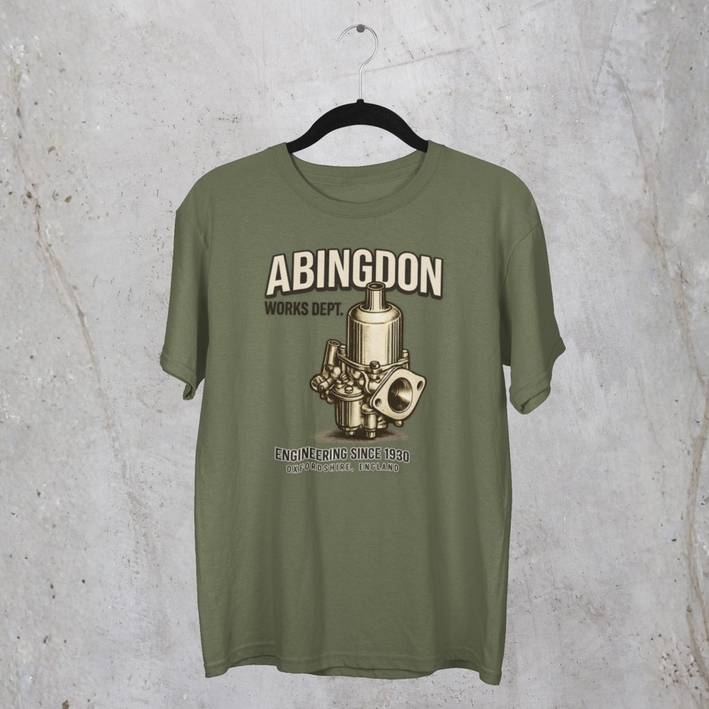 Military green t-shirt with 'Abingdon Works Dept.' graphic on a textured gray background