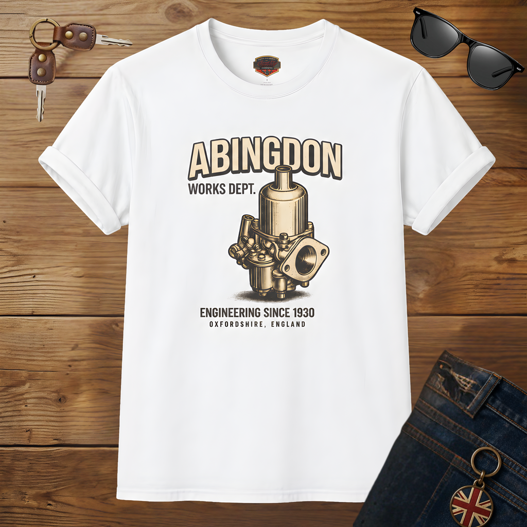 White t-shirt with mechanical design and text on a wooden surface