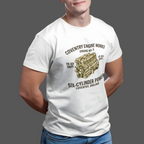 Man wearing a white t-shirt with a 'Coventry Engine Works' graphic and text on a gray background