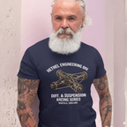 Man wearing a navy blue t-shirt with Hethel Engineering Div. graphic and text.