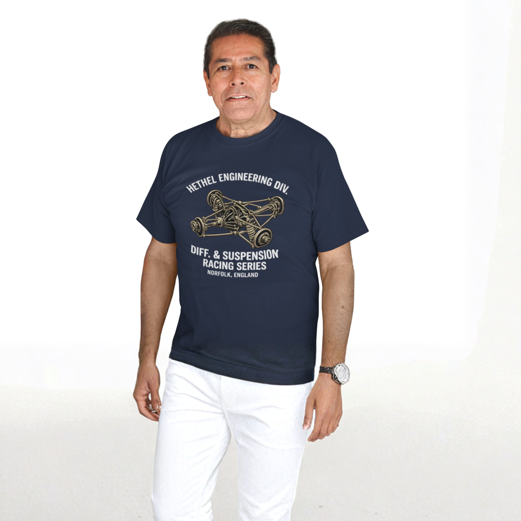 Man wearing a navy blue t-shirt with a mechanical graphic design and text on a white background