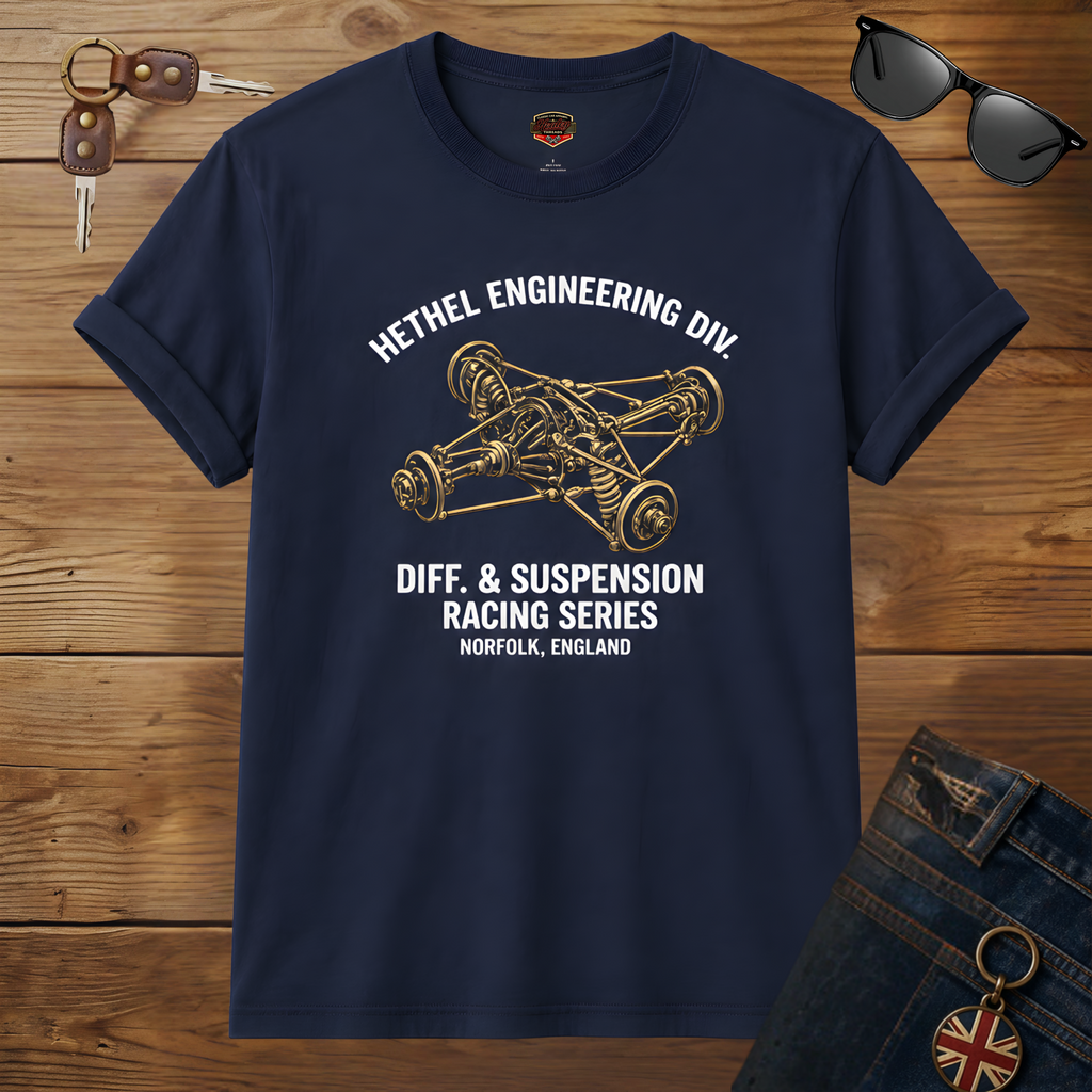 Navy blue t-shirt with engineering graphic and text on a wooden surface.