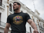 Man wearing a black t-shirt with a British Motor Club logo in an urban setting