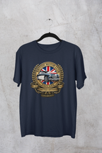 Navy blue t-shirt with a vintage car and British flag design on a hanger against a textured gray background