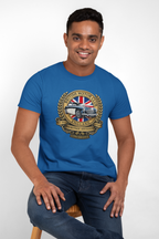 Man wearing a royal blue t-shirt with a British Motor Heritage logo on a white background