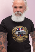 Man wearing a black t-shirt with a British Motor Club logo on a light purple background