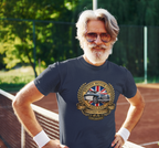 Man wearing a navy blue t-shirt with a British Motor Association logo on a tennis court.