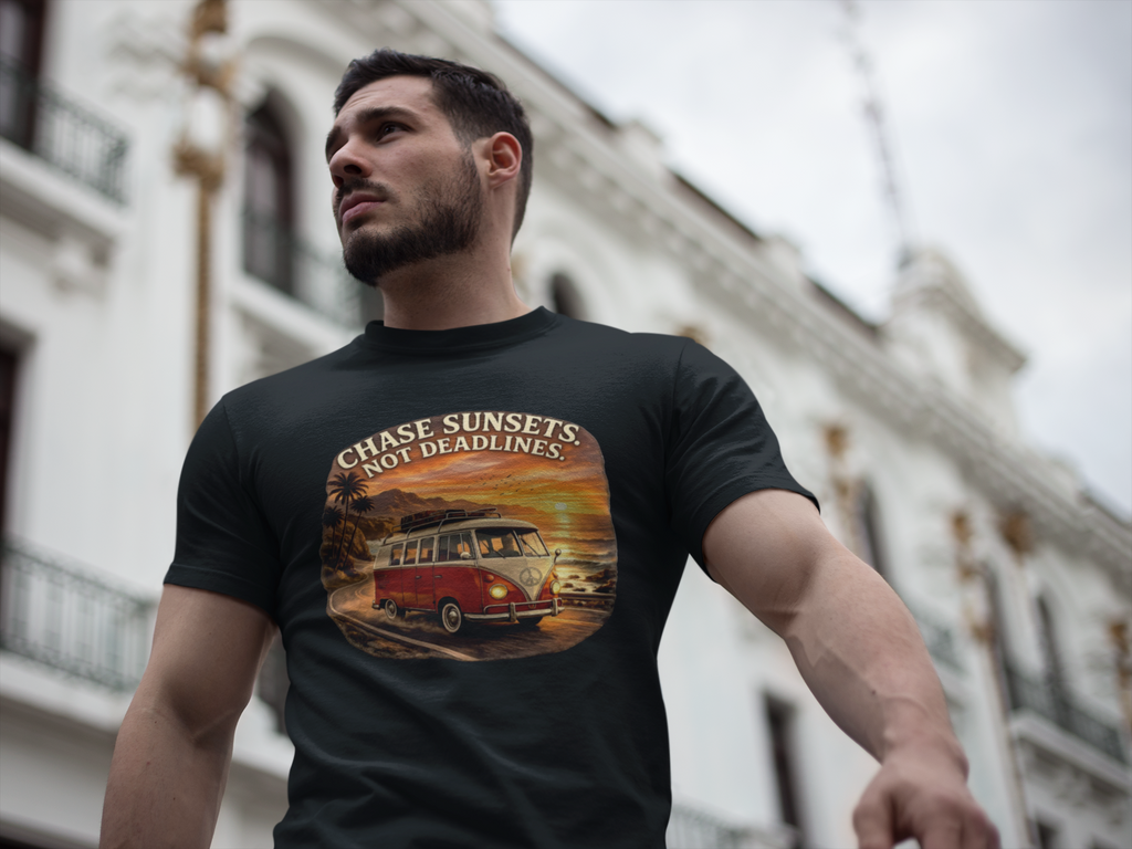 Man wearing a black t-shirt with a graphic classic red van design and text, standing in front of a building.