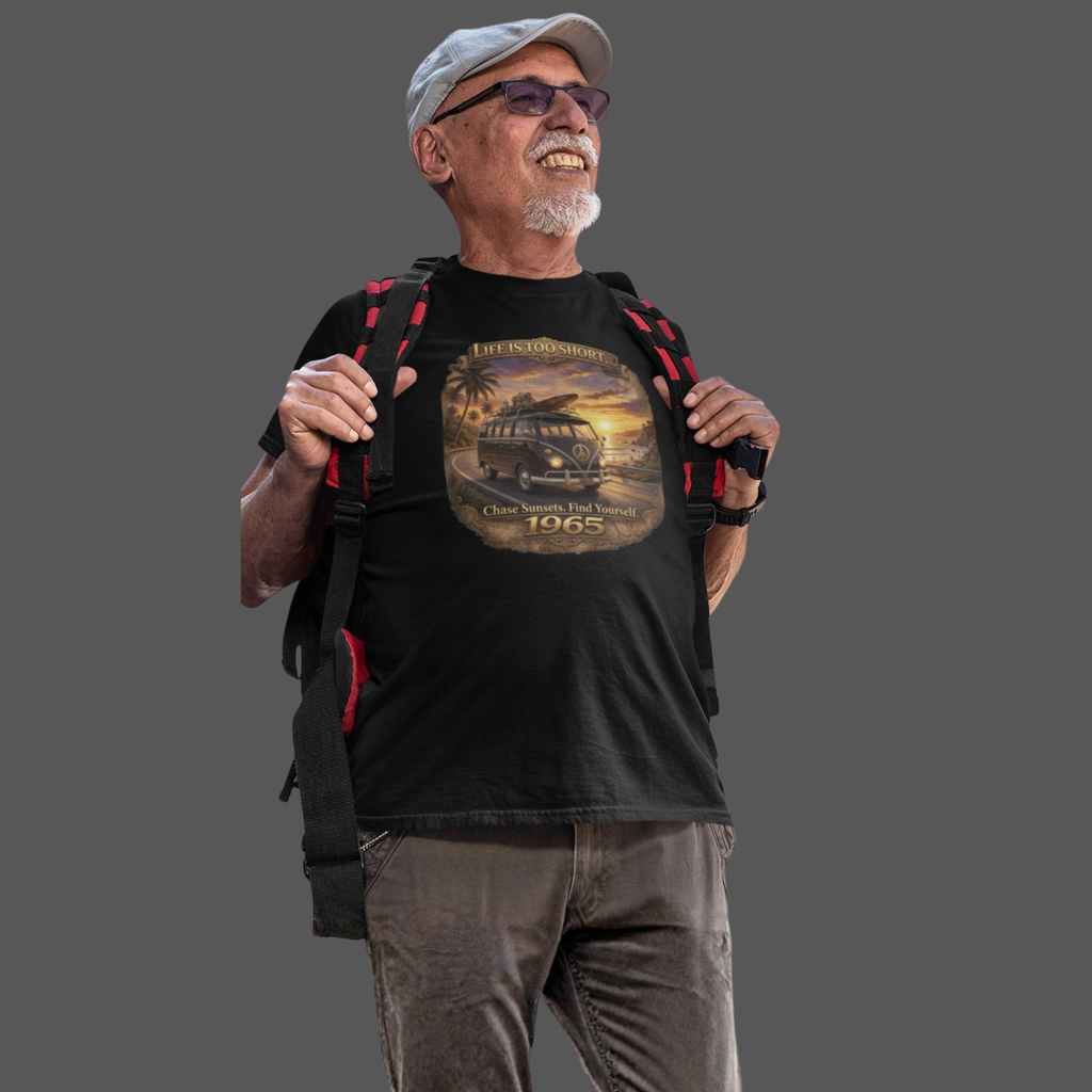Man wearing a black t-shirt with a graphic 1965 custom van design, holding a backpack on a gray background