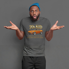 Man wearing a gray t-shirt with '70s Kid' 240Z graphic and car illustration on a gray background