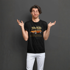Man wearing a black t-shirt with a graphic 240Z design and text, standing against a plain background