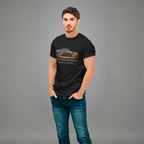 Man wearing a black t-shirt with a classic car graphic design on a gray background