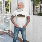Man wearing a white t-shirt with a classic car graphic design, standing on a balcony.