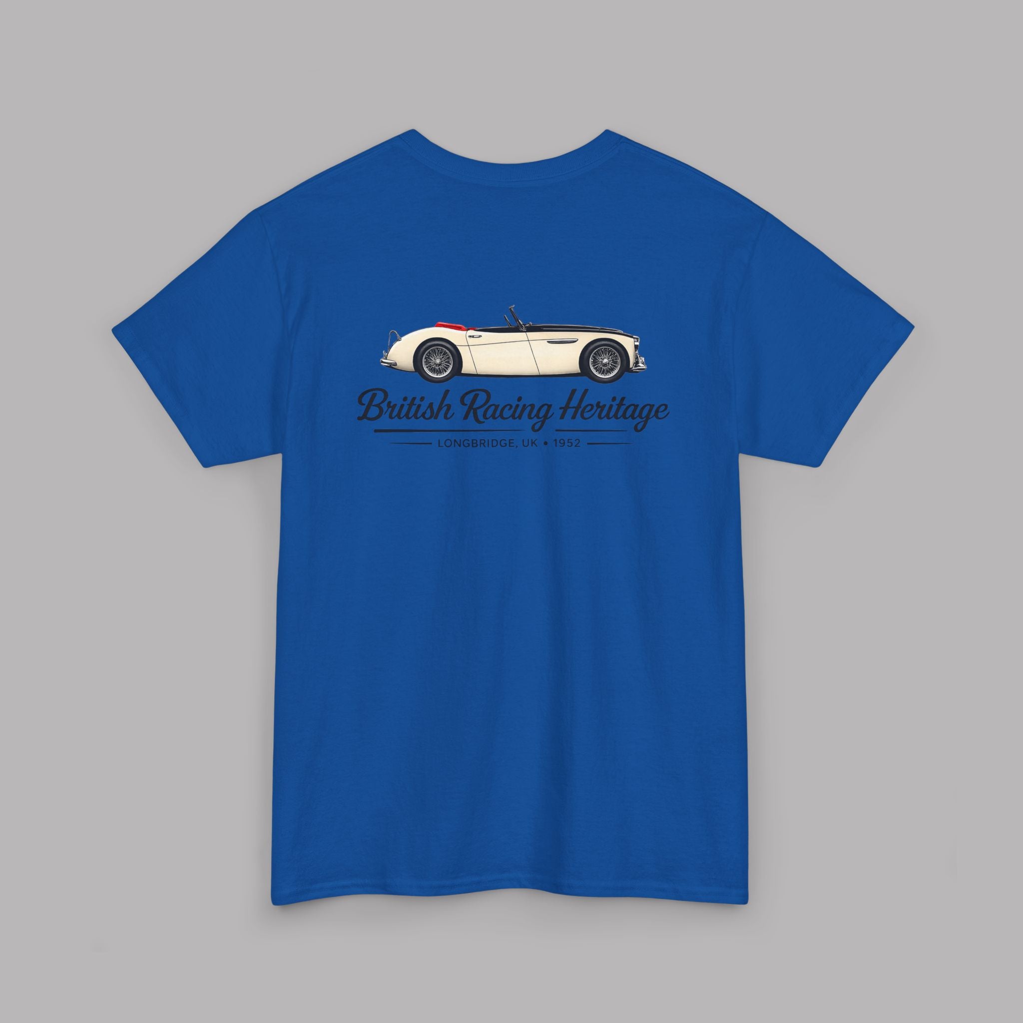Back of a royal blue t-shirt with a Healey classic car graphic design on a gray background