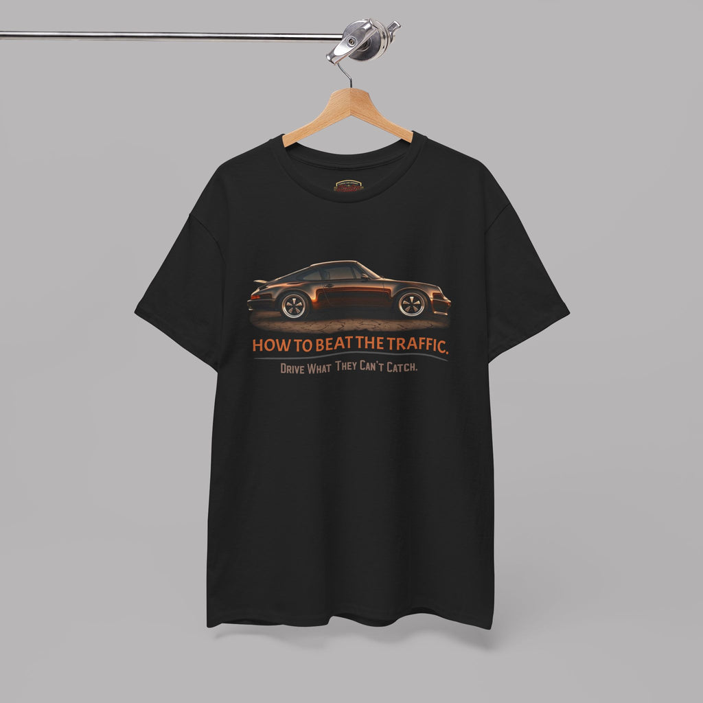 Black t-shirt with classic car graphic and text on a hanger against a gray background