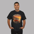 Man wearing a black t-shirt with a classic red van graphic design and text on a gray background