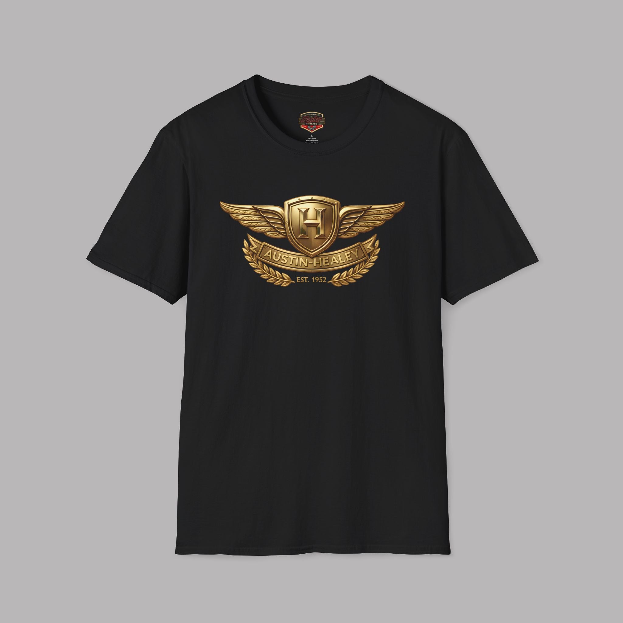 Black t-shirt with a gold Healey emblem on a gray background