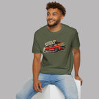 Man wearing a military green t-shirt with 'American Muscle' graphic design on a gray background