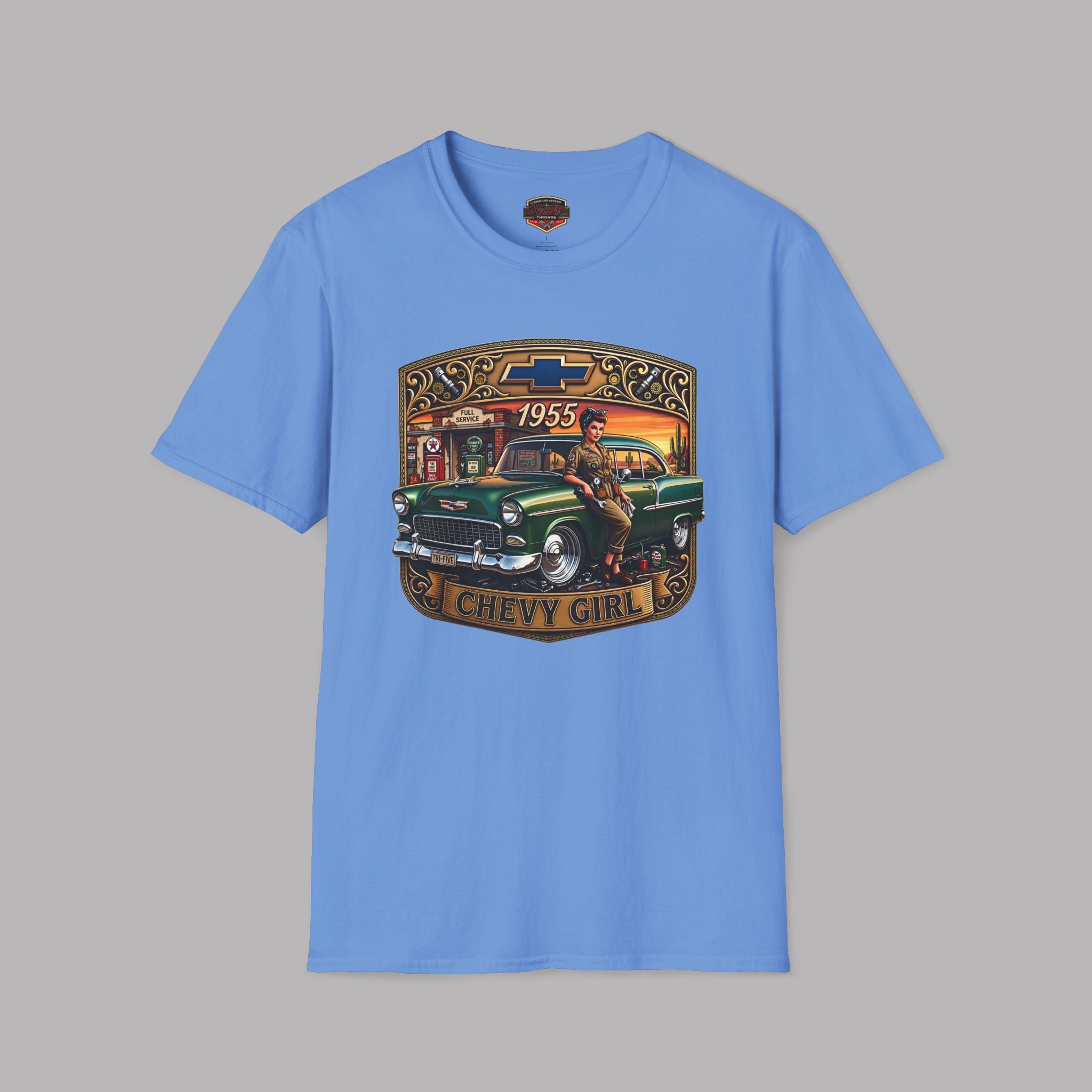 A Carolina blue short-sleeve t-shirt with a vintage-style graphic on the chest featuring a green classic car and the text '1955' and 'CHEVY GIRL'.
