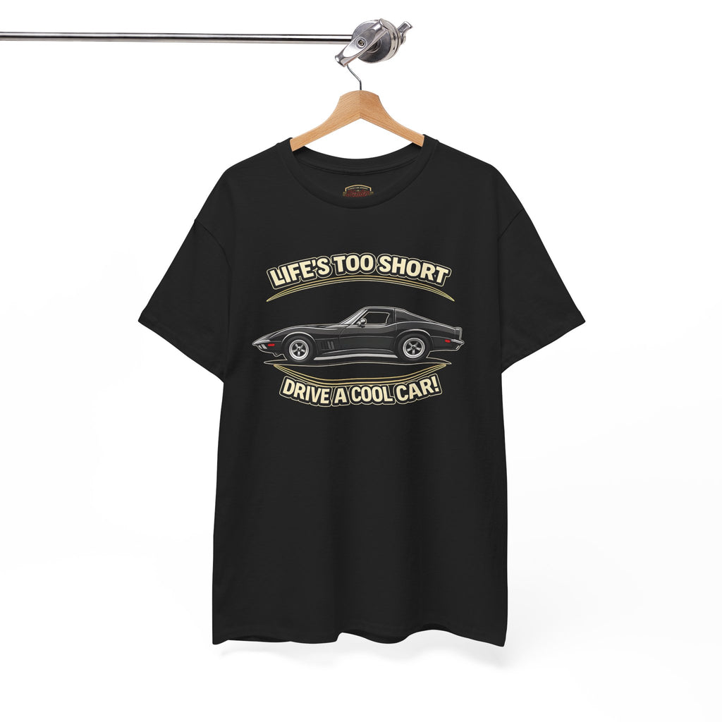 Black t-shirt with vintage vette graphic and text on a hanger against a white background